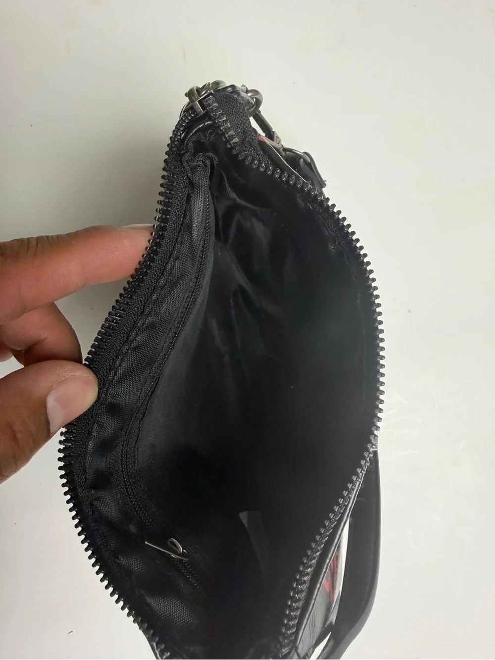 Es hardy Black Wristlet Bag with Embellished Heart Design